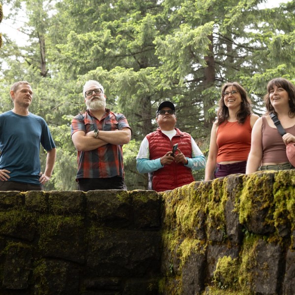a group of people posing for the camera