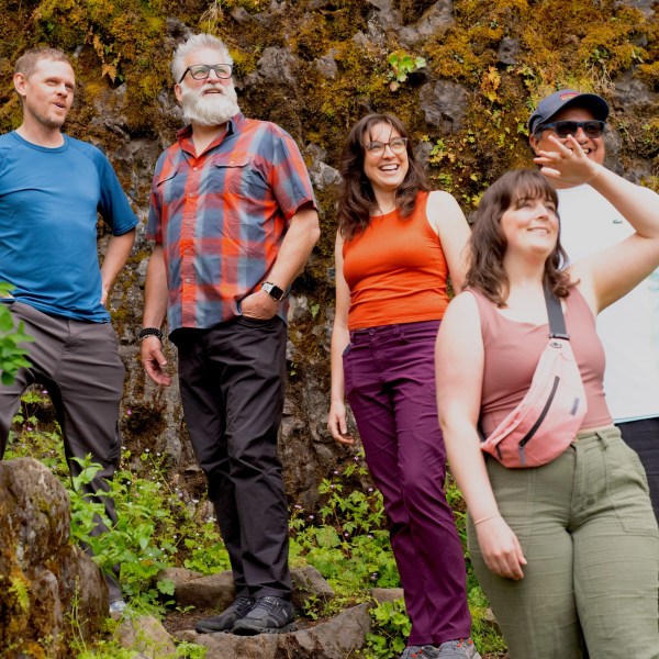 a group of people posing for the camera